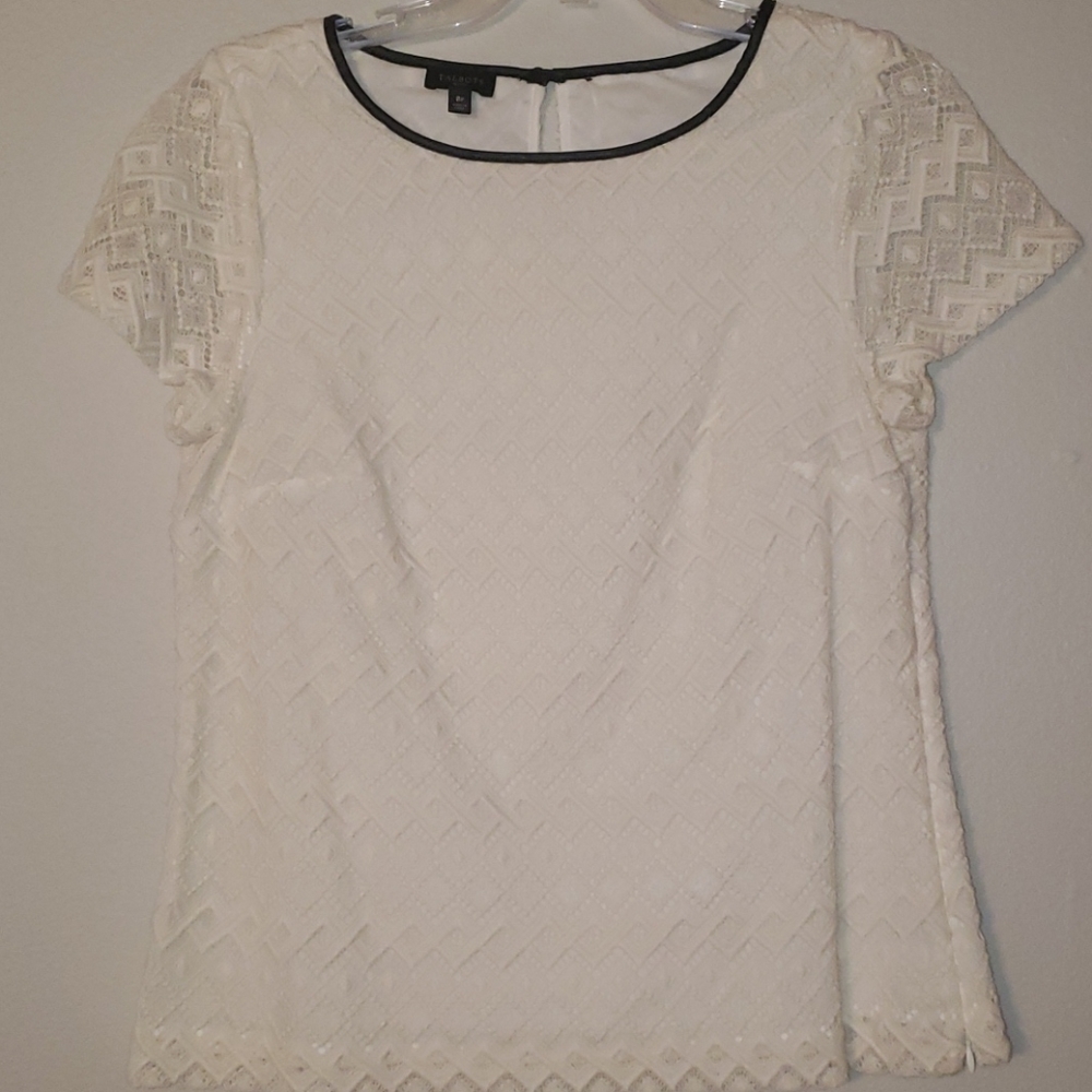 Talbott petite top with leather trim around neck.